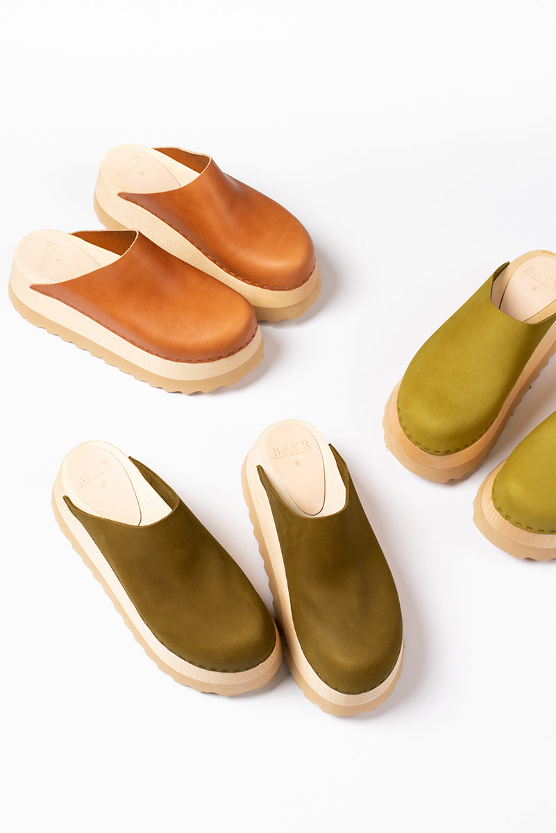 Stylish Bryr Studio clogs in earthy tones, showcasing modern design and comfort